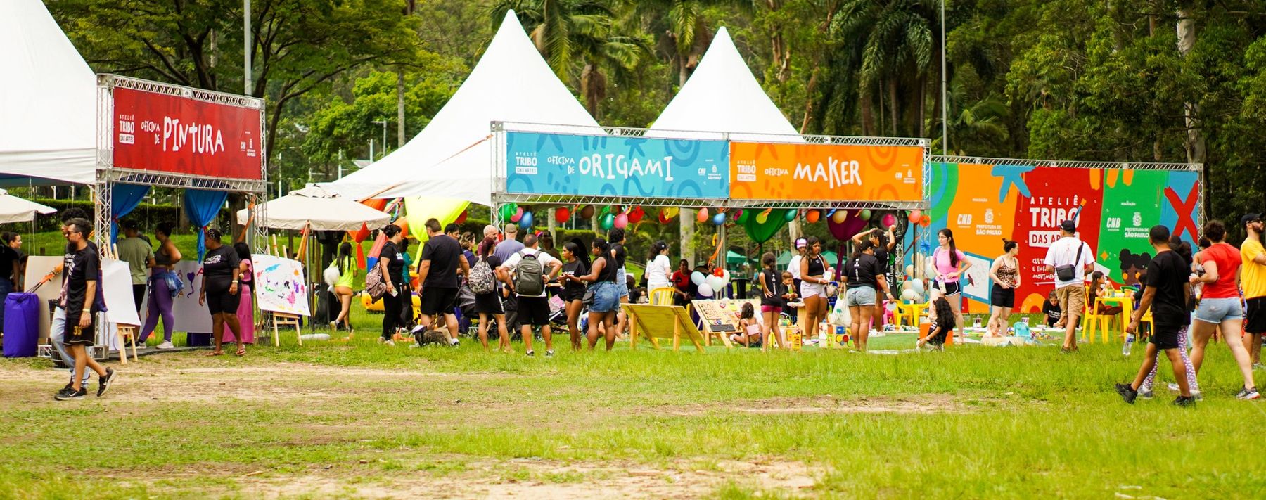Ateliê Tribo das Artes em ação no parque — oficinas de pintura, origami e maker